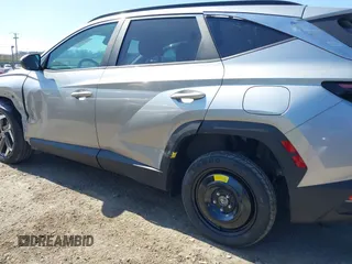 2022 Hyundai Tucson SEL with VIN 5NMJCCAE4NH078991, listed as a IAAI auction lot 41990599 with 37,384 mi miles and . Bid and sale history available at DreamBid. Image 12.