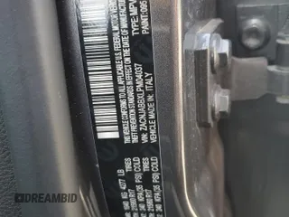 2020 Jeep Renegade Latitude with VIN ZACNJABBXLPM04037, listed as a Copart auction lot 56849225 with 30,738 mi miles and Salvage title. Bid and sale history available at DreamBid. Image 13.