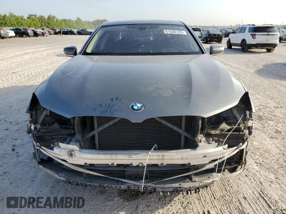 2018 BMW 7 Series 740i with VIN WBA7E2C56JG741634, listed as a Copart auction lot 61530123 with 82,207 mi miles. Bid and sale history available at carsss.com. Image 5.