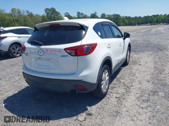 2013 Mazda CX-5 Touring with VIN JM3KE4CE8D0156843, listed as a IAAI auction lot 42018321 with 143,396 mi miles. Bid and sale history available at carsss.com. Image 4.