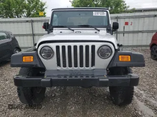 2004 Jeep Wrangler X with VIN 1J4FA39S24P714961, listed as a Copart auction lot 57871235 with 123,164 mi miles and Clean title. Bid and sale history available at DreamBid. Image 5.