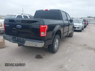 2015 Ford F-150 XLT with VIN 1FTEW1EG4FKD11928, listed as a IAAI auction lot 41912864 with 270,804 mi miles. Bid and sale history available at carsss.com. Image 4.