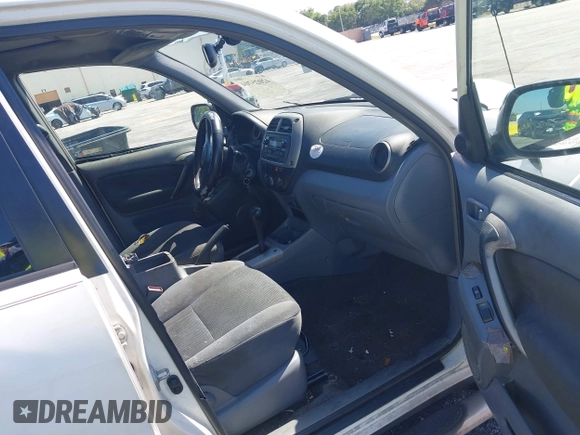 2003 Toyota RAV4 with VIN JTEGH20V030088837, listed as a IAAI auction lot 42025704 with 159,746 mi miles. Bid and sale history available at carsss.com. Image 5.