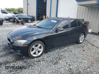 2013 BMW 3 Series 328i with VIN WBA3A5C57DF602652, listed as a Copart auction lot 60874345 with 147,214 mi miles and Salvage title. Bid and sale history available at DreamBid. Image 1.