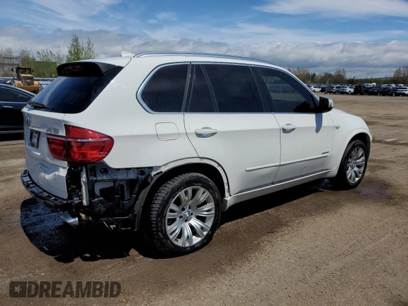 2012 BMW X5 35i z VIN 5UXZV4C59CL759335, wystawiony jako Copart lot #57055065 z przebiegiem 180 589 mil mil oraz Czysty tytuł • Clean title. Historia ofert i sprzedaży dostępna na DreamBid. Obrazek 3.