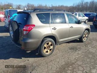 2010 Toyota RAV4 with VIN JTMBF4DV0A5031581, listed as a IAAI auction lot 41714611 with 186,814 mi miles. Bid and sale history available at carsss.com. Image 4.