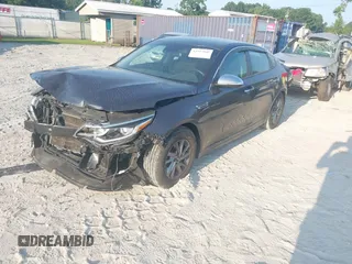 2019 Kia Optima LX with VIN 5XXGT4L36KG297828, listed as a IAAI auction lot 42597545 with 199,652 mi miles and . Bid and sale history available at DreamBid. Image 23.