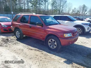 2001 Isuzu Rodeo S with VIN 4S2CK58W814326849, listed as a IAAI auction lot 41769624 with 366,460 mi miles and . Bid and sale history available at DreamBid. Image 1.