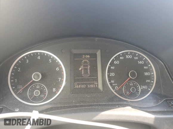 2011 Volkswagen Tiguan with VIN WVGCV7AX8BW511387, listed as a Copart auction lot 57284625 with 284,102 mi miles and Salvage title. Bid and sale history available at DreamBid. Image 9.