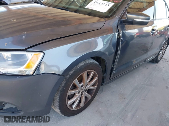 2012 Volkswagen Jetta Sedan SE w/Convenience with VIN 3VWDX7AJ6CM407834, listed as a IAAI auction lot 42013215 with 168,035 mi miles. Bid and sale history available at carsss.com. Image 12.