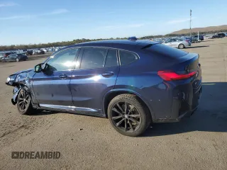 2022 BMW X4 M40i z VIN 5UX43DT02N9K31818, wystawiony jako Copart lot #38495943 z przebiegiem 12 673 mil mil oraz . Historia ofert i sprzedaży dostępna na DreamBid. Obrazek 2.