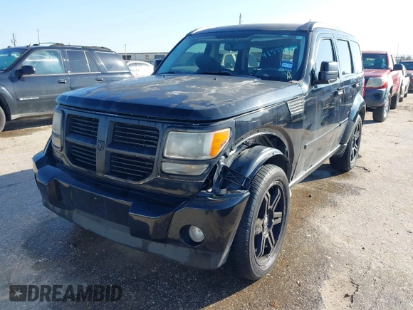 2007 Dodge Nitro SLT with VIN 1D8GT58K97W666680, listed as a IAAI auction lot 41573904 with 171,795 mi miles. Bid and sale history available at carsss.com. Image 2.