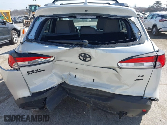 2022 Toyota Corolla Cross LE with VIN 7MUCAABG7NV013235, listed as a IAAI auction lot 41796408 with 20,943 mi miles and . Bid and sale history available at DreamBid. Image 6.
