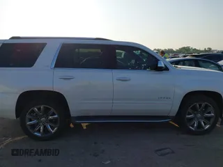 2016 Chevrolet Tahoe LTZ with VIN 1GNSKCKC9GR243895, listed as a IAAI auction lot 42322779 with 162,138 mi miles and . Bid and sale history available at DreamBid. Image 13.