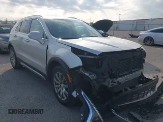 2019 Cadillac XT4 FWD Premium Luxury с VIN 1GYFZCR42KF228986, выставлен на аукционе IAAI как лот 42019157 с пробегом 79 397 миль миль и . История ставок и продаж доступна на DreamBid. Изображение 1.