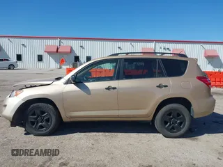2009 Toyota RAV4 with VIN JTMZF33V995000660, listed as a IAAI auction lot 41633209 with 106,959 mi miles. Bid and sale history available at carsss.com. Image 14.