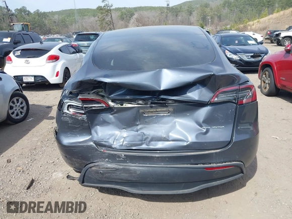 2022 Tesla Model Y Long Range z VIN 7SAYGDEE2NF447998, wystawiony jako IAAI lot #41704968 z przebiegiem 34 088 mil mil oraz . Historia ofert i sprzedaży dostępna na DreamBid. Obrazek 16.