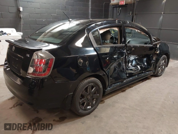 2011 Nissan Sentra SR with VIN 3N1AB6AP8BL647168, listed as a IAAI auction lot 40694237 with 135,622 mi miles and . Bid and sale history available at DreamBid. Image 4.