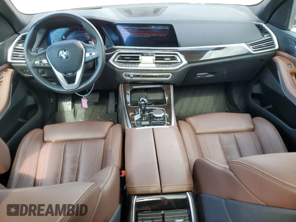 2019 BMW X5 xDrive40i with VIN 5UXCR6C5XKLK80703, listed as a Copart auction lot 63473495 with 57,260 mi miles and Salvage title. Bid and sale history available at DreamBid. Image 8.