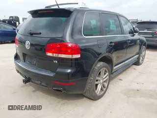 2006 Volkswagen Touareg 4.2L V8 with VIN WVGZM77L16D049838, listed as a IAAI auction lot 42069014 with 139,937 mi miles and . Bid and sale history available at DreamBid. Image 4.