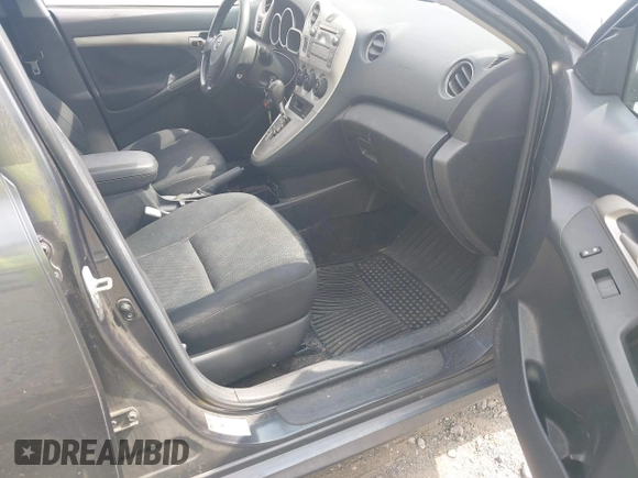 2009 Toyota Matrix S with VIN 2T1KE40E49C026519, listed as a IAAI auction lot 42743489 with 240,243 mi miles and . Bid and sale history available at DreamBid. Image 5.