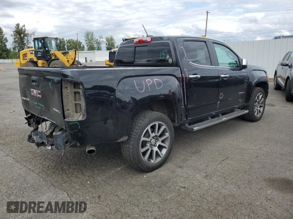 2020 GMC Canyon 4WD Denali with VIN 1GTG6EEN0L1243031, listed as a Copart auction lot 67939014 with 106,294 mi miles and Salvage Title. Bid and sale history available at carsss.com. Image 3.