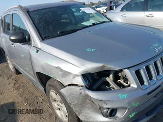 2016 Jeep Compass 75th Anniversary with VIN 1C4NJCBB1GD763361, listed as a IAAI auction lot 41976208 with 144,399 mi miles. Bid and sale history available at carsss.com. Image 6.
