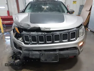2019 Jeep Compass Trailhawk with VIN 3C4NJDDB9KT765459, listed as a IAAI auction lot 41319891 with 83,860 mi miles and . Bid and sale history available at carsss.com. Image 6.