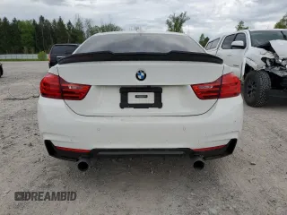 2014 BMW 4 Series 435i xDrive z VIN WBA3R5C53EK189033, wystawiony jako Copart lot #56394675 z przebiegiem 101 183 mil mil oraz Szkody całkowita. Historia ofert i sprzedaży dostępna na DreamBid. Obrazek 6.