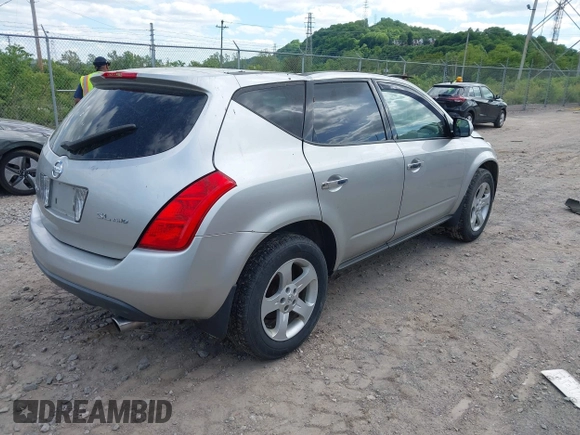 2003 Nissan Murano SE z VIN JN8AZ08W43W214000, wystawiony jako IAAI lot #42274384 z przebiegiem 98 927 mil mil oraz . Historia ofert i sprzedaży dostępna na DreamBid. Obrazek 4.