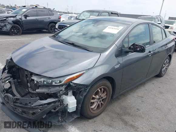 2021 Toyota Prius LE with VIN JTDKAMFP0M3193305, listed as a IAAI auction lot 42283494 with 322,523 mi miles and . Bid and sale history available at DreamBid. Image 2.