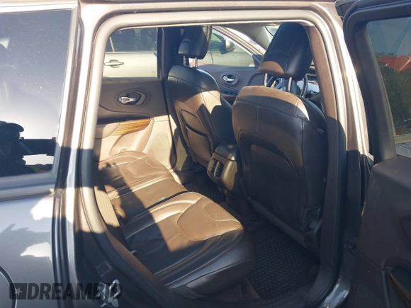 2014 Jeep Cherokee Trailhawk with VIN 1C4PJMBS6EW167517, listed as a IAAI auction lot 41947552 with 233,572 mi miles. Bid and sale history available at carsss.com. Image 8.