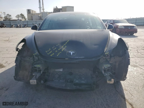 2022 Tesla Model 3 with VIN 5YJ3E1EA1NF184721, listed as a Copart auction lot 48852115 with 86,949 mi miles and Salvage Title. Bid and sale history available at carsss.com. Image 5.