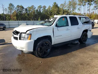 2012 Chevrolet Suburban LT with VIN 1GNSCJE08CR323931, listed as a Copart auction lot 77885054 with 0 mi miles and Non Repairable. Bid and sale history available at carsss.com. Image 1.