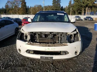 2012 Infiniti QX56 7-passenger with VIN JN8AZ2NE1C9021857, listed as a Copart auction lot 76967164 with 153,958 mi miles and Salvage Title. Bid and sale history available at carsss.com. Image 5.