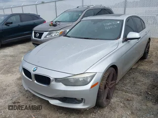 2014 BMW 3 Series 328i with VIN WBA3A5G52ENP31318, listed as a IAAI auction lot 42801411 with 149,355 mi miles and . Bid and sale history available at DreamBid. Image 2.