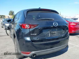 2017 Mazda CX-5 Touring with VIN JM3KFACL2H0146213, listed as a IAAI auction lot 41626112 with 77,829 mi miles and . Bid and sale history available at carsss.com. Image 3.