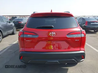 2023 Toyota Corolla Cross XLE z VIN 7MUDAAAG0PV065993, wystawiony jako IAAI lot #42629443 z przebiegiem 16 056 mil mil oraz . Historia ofert i sprzedaży dostępna na DreamBid. Obrazek 16.