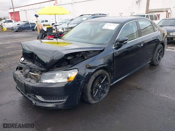 2015 Volkswagen Passat 1.8T SE w/Sunroof & Nav with VIN 1VWBT7A30FC031397, listed as a IAAI auction lot 41466798 with 70,714 mi miles. Bid and sale history available at carsss.com. Image 2.