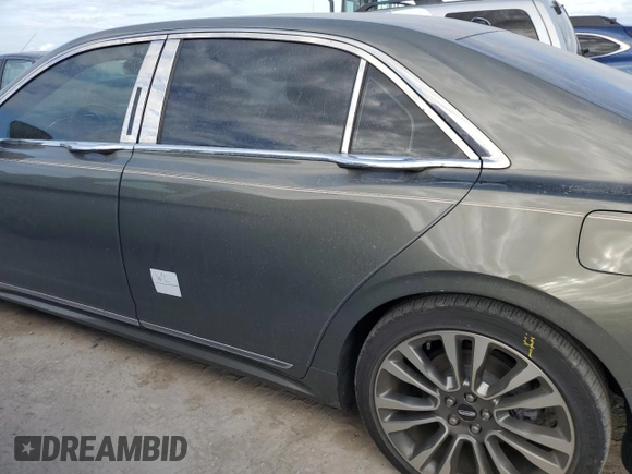 2017 Lincoln Continental Select z VIN 1LN6L9SP9H5609114, wystawiony jako Copart lot #75826794 z przebiegiem 21 770 mil mil oraz Szkoda całkowita • Salvage title. Historia ofert i sprzedaży dostępna na DreamBid. Obrazek 12.