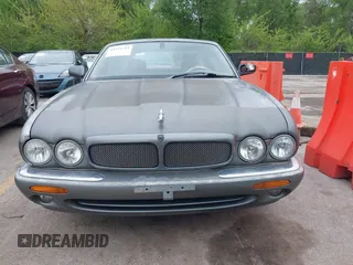 2002 Jaguar XJ with VIN SAJDA12CX2LF49531, listed as a IAAI auction lot 42124743 with 120,486 mi miles. Bid and sale history available at carsss.com. Image 6.