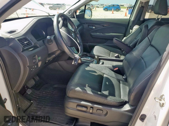 2020 Honda Pilot Touring 7-Passenger with VIN 5FNYF6H69LB018905, listed as a Copart auction lot 61209685 with 61,637 mi miles and Salvage title. Bid and sale history available at DreamBid. Image 7.