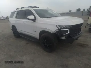 2022 Chevrolet Tahoe LT z VIN 1GNSKNKD5NR143276, wystawiony jako IAAI lot #42268541 z przebiegiem 54 463 mil mil oraz . Historia ofert i sprzedaży dostępna na DreamBid. Obrazek 1.