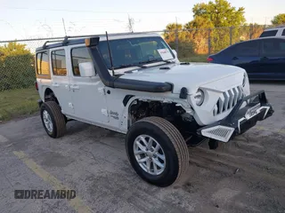 2019 Jeep Wrangler Unlimited Sport S with VIN 1C4HJXDNXKW681153, listed as a IAAI auction lot 41848874 with 76,111 mi miles and . Bid and sale history available at DreamBid. Image 1.