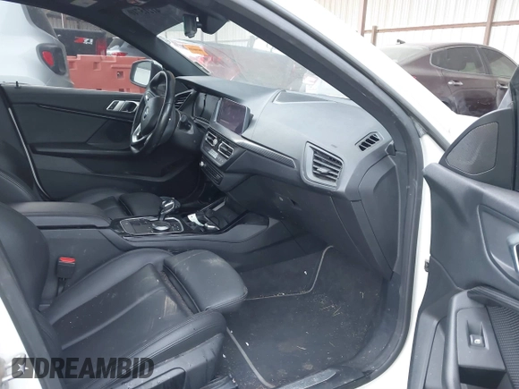 2021 BMW 2 Series 228i xDrive with VIN WBA73AK07M7H56978, listed as a IAAI auction lot 41215710 with 77,965 mi miles and . Bid and sale history available at DreamBid. Image 4.