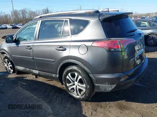 2016 Toyota RAV4 LE with VIN JTMBFREV9GJ071041, listed as a IAAI auction lot 41410462 with 57,396 mi miles. Bid and sale history available at carsss.com. Image 3.
