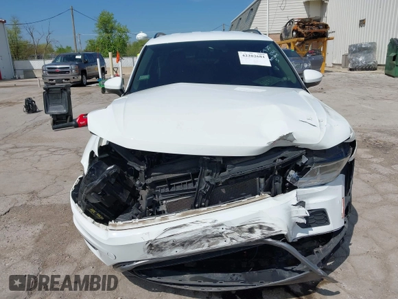 2019 Volkswagen Tiguan S with VIN 3VV0B7AX0KM027036, listed as a IAAI auction lot 42202681 with 75,192 mi miles and . Bid and sale history available at DreamBid. Image 13.