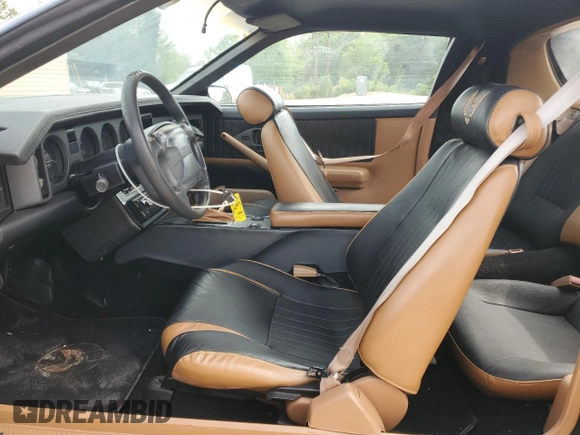 1991 Pontiac Firebird z VIN 1G2FS23T9ML201636, wystawiony jako Copart lot #53856725 z przebiegiem 1 278 739 mil mil oraz Czysty tytuł • Clean title. Historia ofert i sprzedaży dostępna na DreamBid. Obrazek 7.
