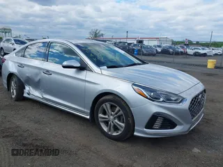 2019 Hyundai Sonata Sport z VIN 5NPE34AFXKH740037, wystawiony jako IAAI lot #42215038 z przebiegiem 79 714 mil mil oraz . Historia ofert i sprzedaży dostępna na DreamBid. Obrazek 1.