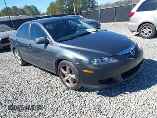 2005 Mazda Mazda6 i with VIN 1YVFP80C755M22933, listed as a IAAI auction lot 41690663 with 220,301 mi miles. Bid and sale history available at carsss.com. Image 1.